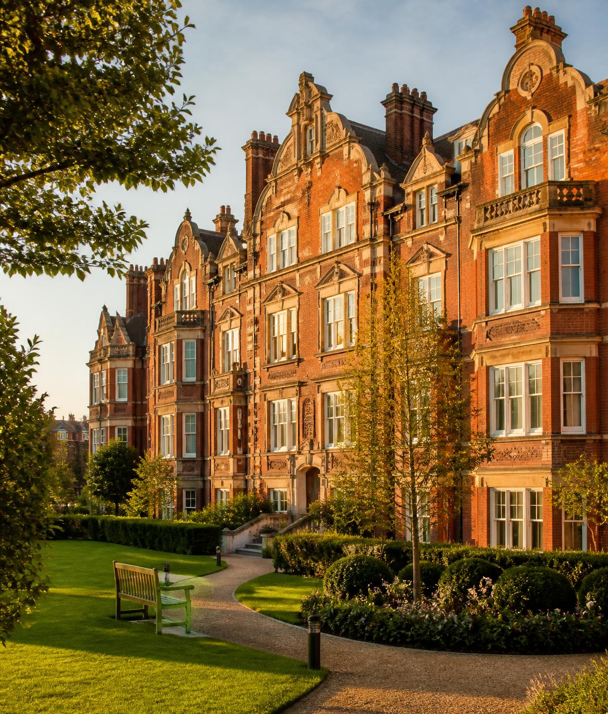 Victorian red-brick mansion block with communal gardens in Richmond, South West London